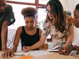 A group collaborating in a project management meeting.