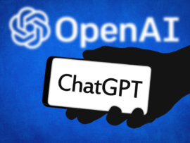 The ChatGPT logo on a phone in front of the OpenAI logo.