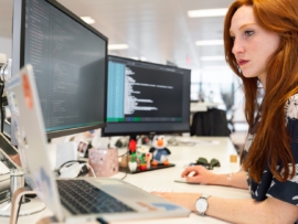 A programmer works with code.