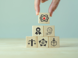 Core values icon on wood blocks.